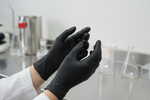 Load image into Gallery viewer, Black Nitrile Glove with female hands
